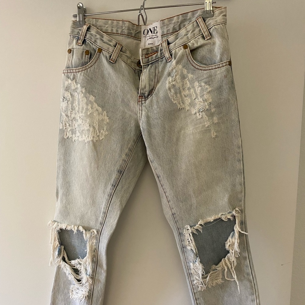 Super distressed low rise jeans